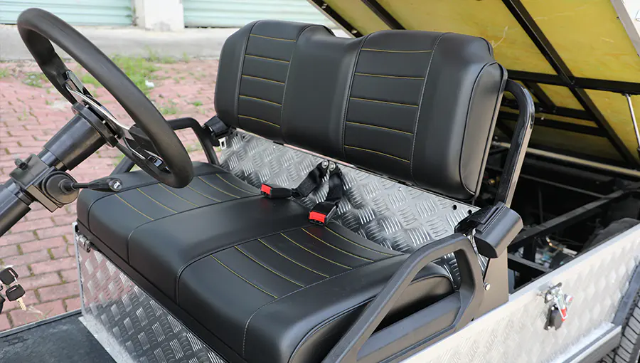 Luxury leather seats on Tara medium speed vehicle, with custom two-tone finish, contrast stitching, and enhanced comfort