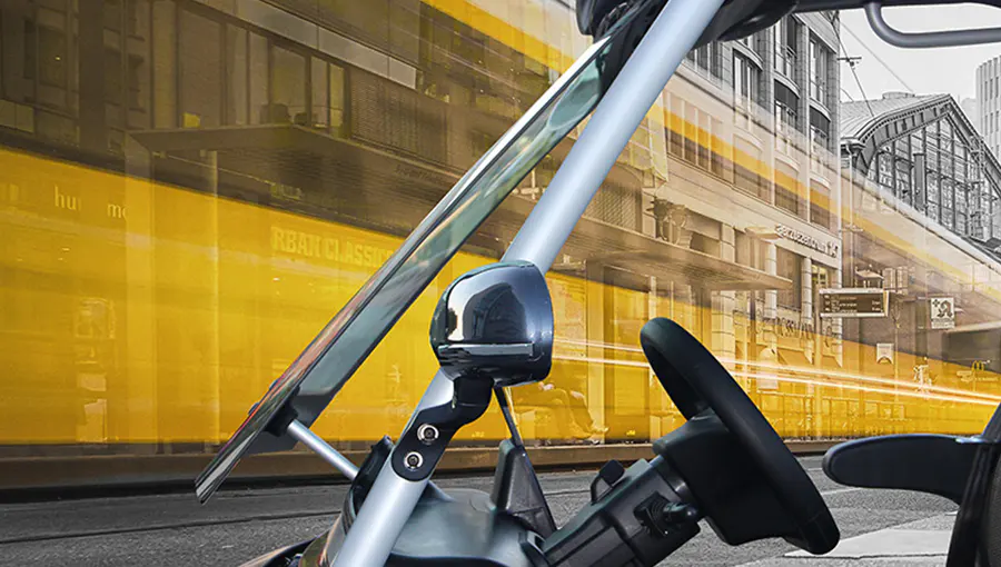 Close-up of Tara T3 2+2 medium speed vehicle front windshield made of high-quality, impact-resistant material for driver safety