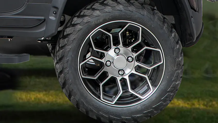 Close-up of Tara medium speed vehicle silent tires featuring aggressive off-road tread pattern for enhanced traction and reduced noise