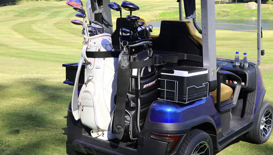 Rear view of Tara Spirit Plus medium speed vehicle showing multiple accessories including storage compartments and holders