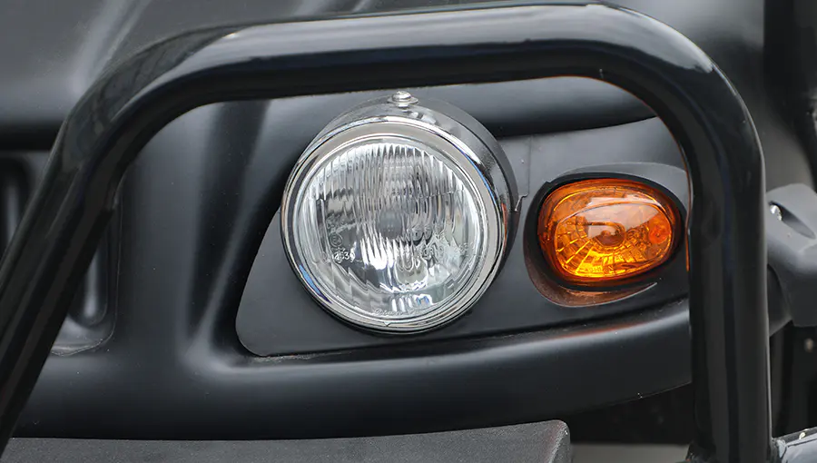 Close-up of LED headlights on Tara Turfman 700 EEC, providing clear and powerful illumination for safe night driving