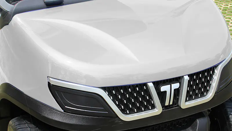 Close-up of Tara medium speed vehicle front end showcasing aerodynamic styling and sturdy construction for enhanced performance
