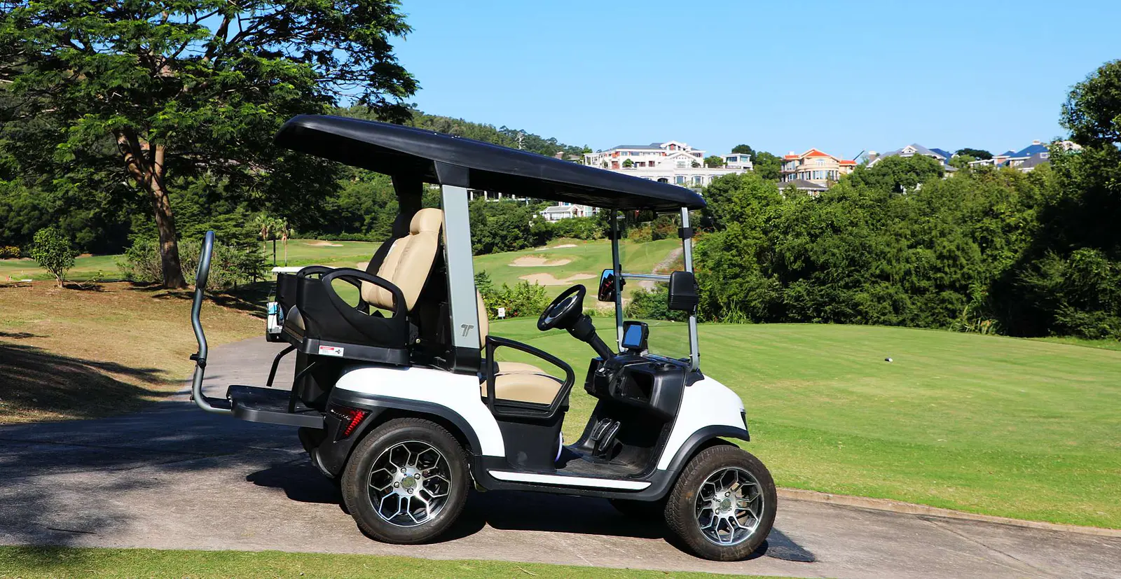 Tara Roadster Medium Speed Vehicle with Rear Seat on Course