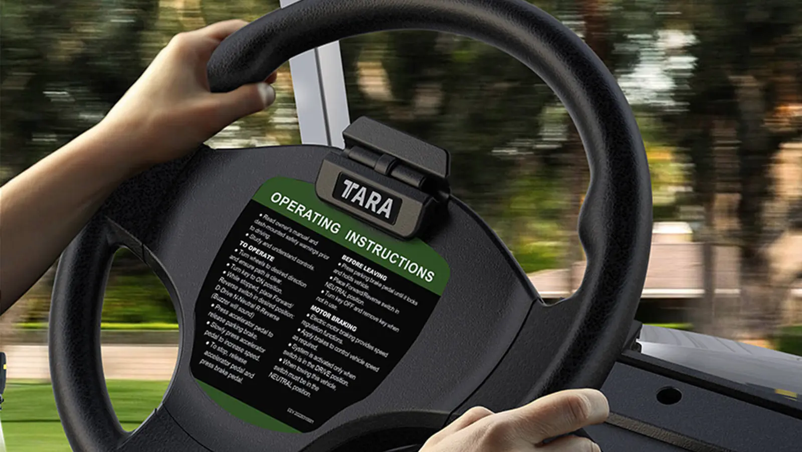 Scorecard holder mounted on steering wheel of Tara medium speed vehicle