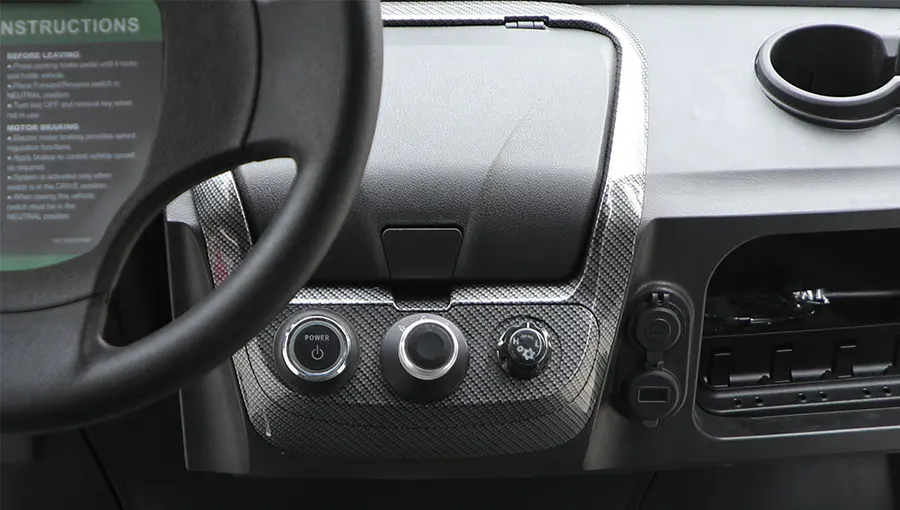 Interior view of Tara medium speed vehicle showing well-organized control switches within reach of the driver