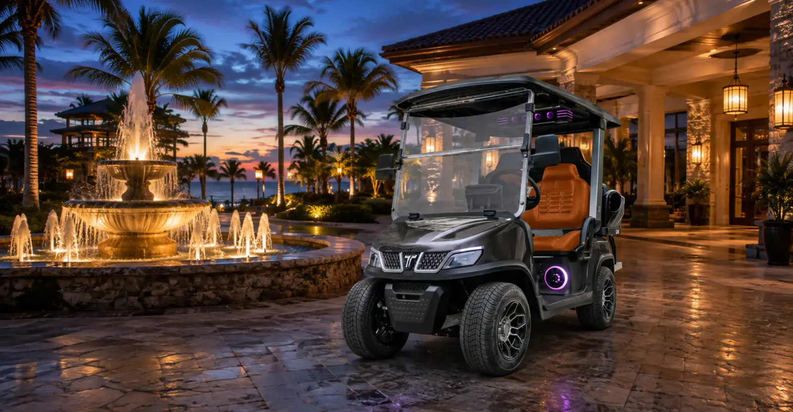 TARA medium speed vehicle at a resort entrance in the evening